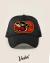 Black trucker hat featuring a colorful dragon design with the text "LIVE FAST DIE LAST" and the brand name "Vudu!"