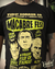 Camiseta preta Macabre Fest com ilustrações estilo vintage dos monstros Frankenstein, Drácula e A Múmia em tons amarelo e verde neon.