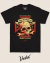 Black T-shirt with a vintage style graphic of a skull holding a wrench in its mouth, featuring red and beige accents, and text reading "Vudu Kustoms Co," "The Original," "Hot Rod," "Chopper," "Est. 08," and "Made in Hell."
