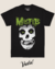 Camiseta preta da banda Misfits com estampa de caveira e detalhes em verde.