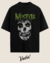 Camiseta oversized preta com estampa de caveira e o nome "Misfits" em verde, da marca Vudu.