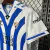 Camisa Málaga Conceito 2024/25 Torcedor Masculina - Branca e Azul - Athletic Store | Artigos Esportivos