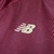 Camisa de viagem São Paulo FC 2025 New Balance vinho masculina com escudo bordado e logo dourado
