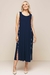 Vestido midi de visco crepe na cor bege, com detalhes em branco, confortável e elegante para o verão.