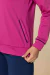 Detalhe do conjunto Thermo com calça tradicional, destacando a jaqueta rosa e o bolso lateral.
