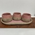 Conjunto 03 copos 100ml “M; A; E - familia; amor; gratidao” + apoio 20x13cm Rosa - comprar online