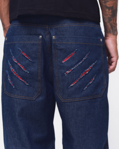 Imagem do CALCA JEANS RASGO DENTE DE SABRE