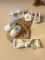 Faixa de Cabelo Maxi Laço Canelada OffWhite Inverno - Acessório cabelo bebê menina | BABYMONÍ® - comprar online
