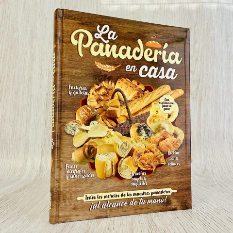 Portada del libro "La Panadería en casa", que incluye diferentes tipos de panes y facturas, con un diseño atractivo y colorido.