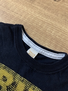 Blusa preta com estampa mostarda (Trick Nick) na internet