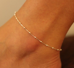 Tornozeleira de bolinhas