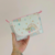 Necessaire Farmacinha Arco Íris Aquarela - Atelie Nuvem de Coco | Tudo para o enxoval do seu bebê