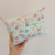 Necessaire Porta Fralda e Lenço Umedecido Floral New na internet