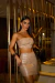 Conjunto cropped com saia na internet