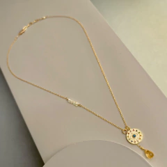 Collar corto, cadena dorada, dije ojo y gota - comprar online