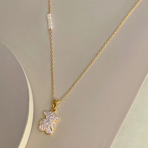 Collar corto, cadena dorada, dije osito