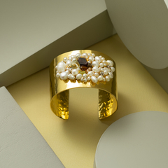 Pulsera bañada en oro bordad con piedras en internet