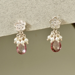 Aros combinados con topacio rosa y racimo de perlas.
