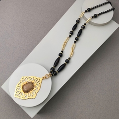 Collar medallon con cuazo rutilado - comprar online
