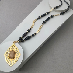 Collar medallon con cuazo rutilado
