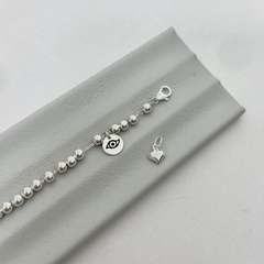 Pulsera cadena y bolitas de plata con dije ojito protector o corazón en internet