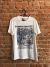 Camiseta AMP+451 Jardim das Delícias, por Laerte