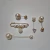KIT COM ALFINETES PRESILHAS E BLOCHES
