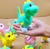 Dinossauro a Corda Fricção Pula Pula Dino Baby Brinquedos Divertidos Infantil para Bebê Crianças Presente - comprar online