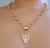Kit Conjunto Colar e Brincos Feminino Corrente Elo Português com Pingente Onça Tigre Vazado Folheado Ouro Presente na internet