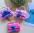 Bolsinha Infantil Menina Mini Bag Alça Corrente Mão Pérola Bolsa Disney Personagem Stitch lilo Moda Blogueirinha Meninas 2024