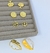 Cartela semaninha com 7 brincos Folheado a Ouro 18k Dourado Par de Brinco antialégico Feminino Adulto e Infantil Presente - Store LVO