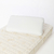 Almohada Naturalfoam Classic sobre un colchón de látex natural