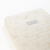 Colchón Naturalfoam 100% látex natural con diseño de hojas en color beige.