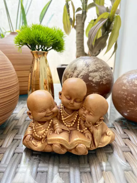 Budinhas lendo dourado