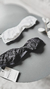 Conjunto de lencería desmontable en tonos blanco y negro, ideal para ocasiones especiales, y estrapless