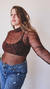 Body de microtul con estampado de cebra, diseñado para resaltar la figura femenina con un estilo moderno y audaz.
