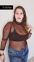 Body de microtul con estampado de cebra, manga larga y escote redondo, modelado por una mujer talle xl.