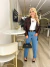 Calça Jeans Mom Lavagem Média na internet