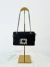 Bolsa preta com detalhe em pedras 