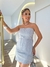 conjunto blusa e saia com aplicações