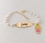 Pulseira Infantil Pérola com nome e pingente menininha