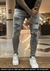 Calça Super Skinny Cinza c/rasgos a laser REF:181 - comprar online