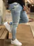 Calça Super Skinny Com Avol Lateral e Rasgos - comprar online