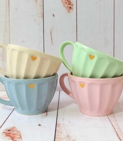 Taza de te vainilla decorada