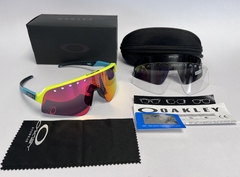 Gafas Oakley Sutro Lite Sweep Vented Marco Amarillo Patilla Celeste Espejado Naranja