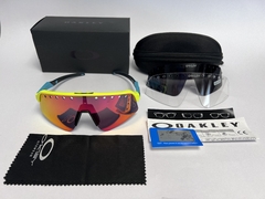 Gafas Oakley Sutro Lite Sweep Vented Marco Amarillo Patilla Celeste Espejado Naranja en internet