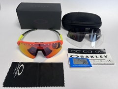 Gafas Oakley Sutro Lite Sweep Vented Marco Naranja Patilla Amarillas Espejado Naranja - comprar online