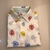 Imagem do CAMISA M.CURTA INF. FOLHAS BRANCO 1/2/3