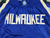 SHORTS NBA LOGO - Milwaukee Bucks City Edition 2022/23 - loja online