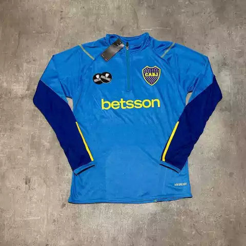 Buzo Boca medio cierre celeste Betsson